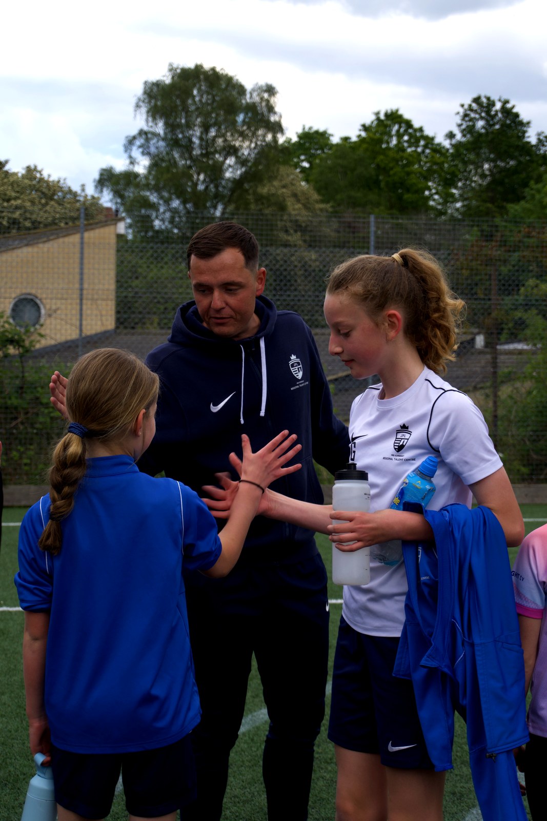 Coach working with players at Mid Somerset RTC